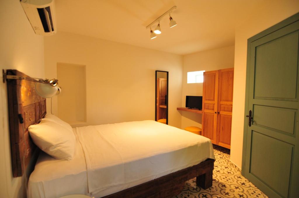 Postel nebo postele na pokoji v ubytování Oalis Boutique Hotel