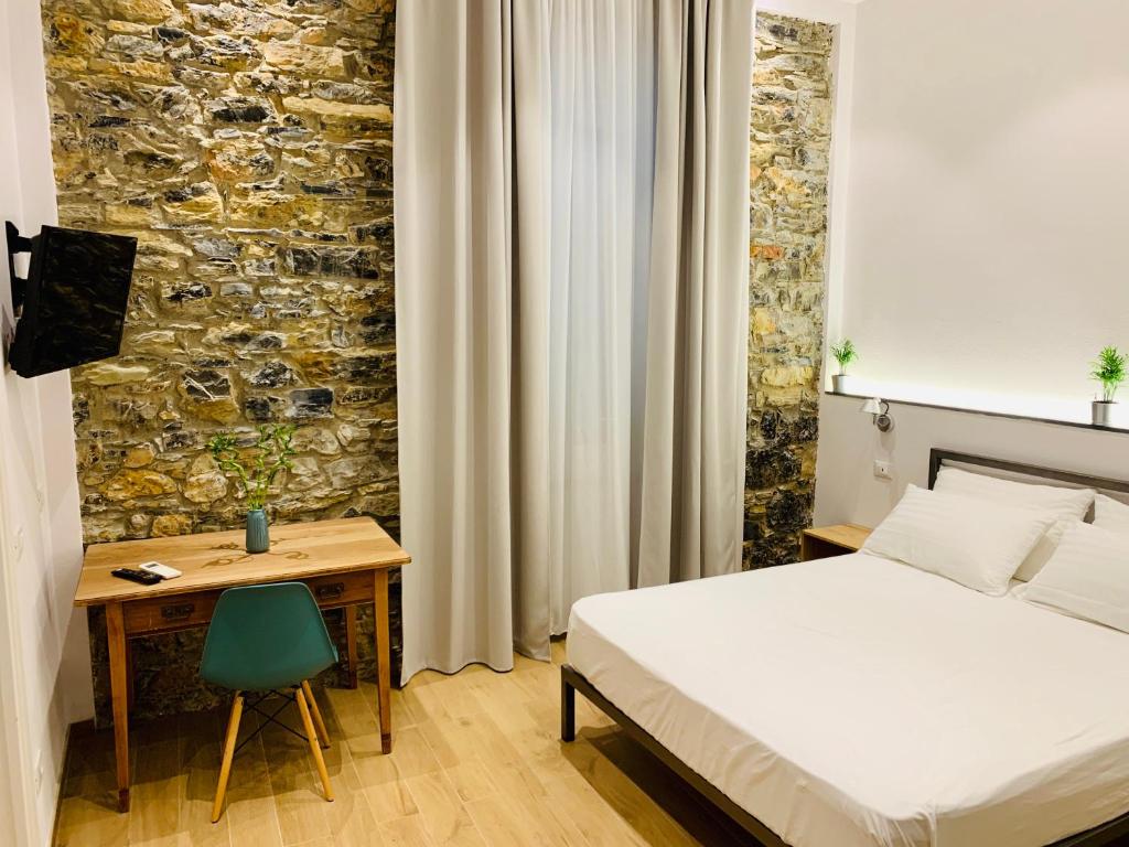 Postel nebo postele na pokoji v ubytování A Ca' De Mananan Guesthouse
