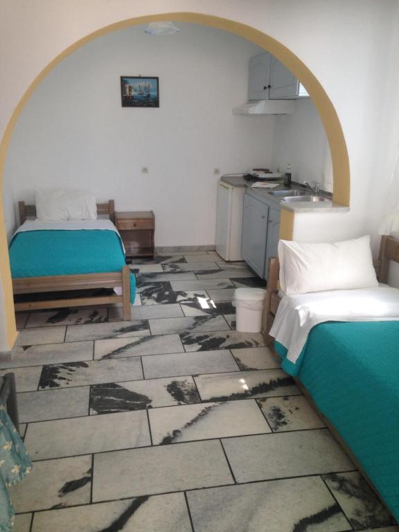 Postel nebo postele na pokoji v ubytování villa polemis