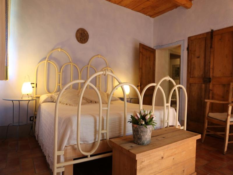 Postel nebo postele na pokoji v ubytování Agriturismo Borgo Santa Maria