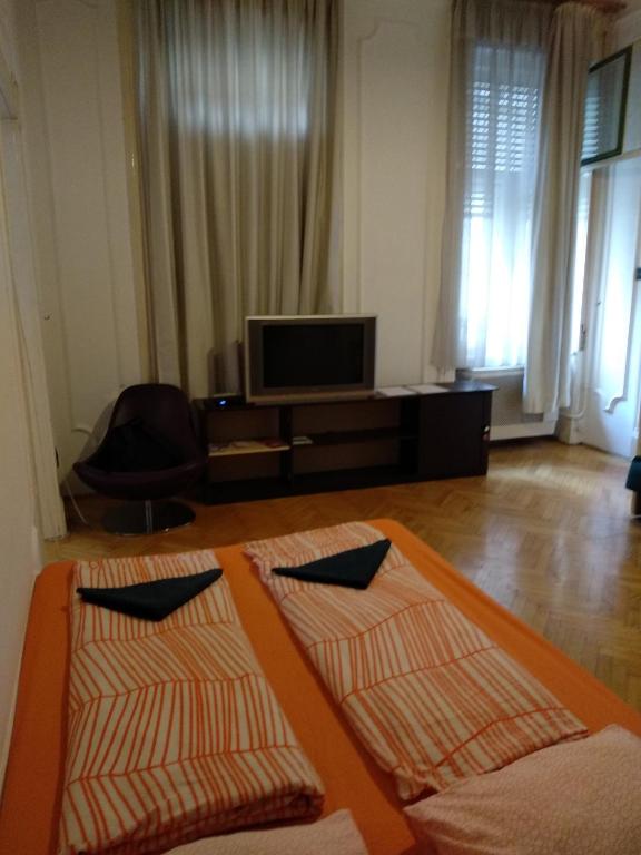 Postel nebo postele na pokoji v ubytování HoBar Hostel