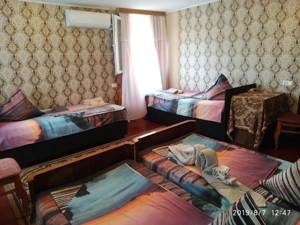 Postel nebo postele na pokoji v ubytování Downtown guest house