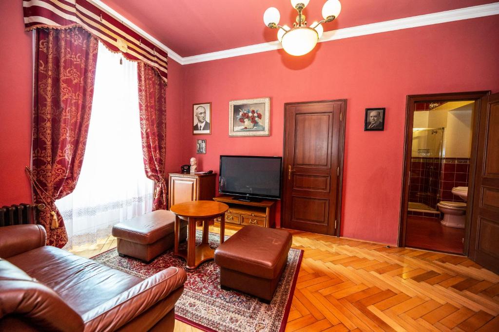 TV a/nebo společenská místnost v ubytování Grand Hotel Praha
