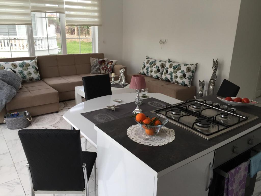 Posezení v ubytování BELKA GOLF RESİDENCE Deluxe apt Poolside BELEK