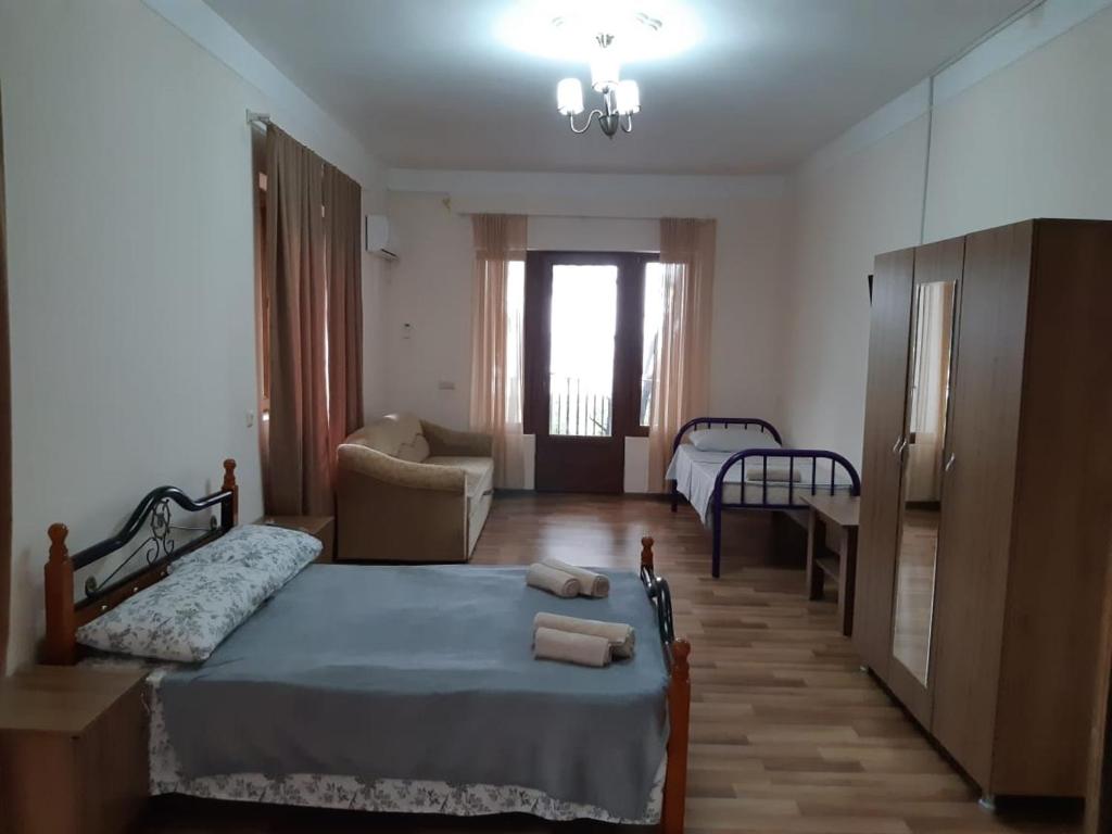 Postel nebo postele na pokoji v ubytování Hotel Niko