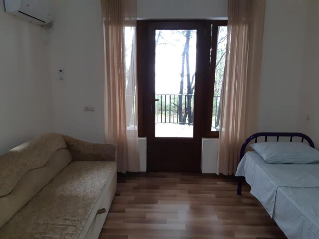 Postel nebo postele na pokoji v ubytování Hotel Niko