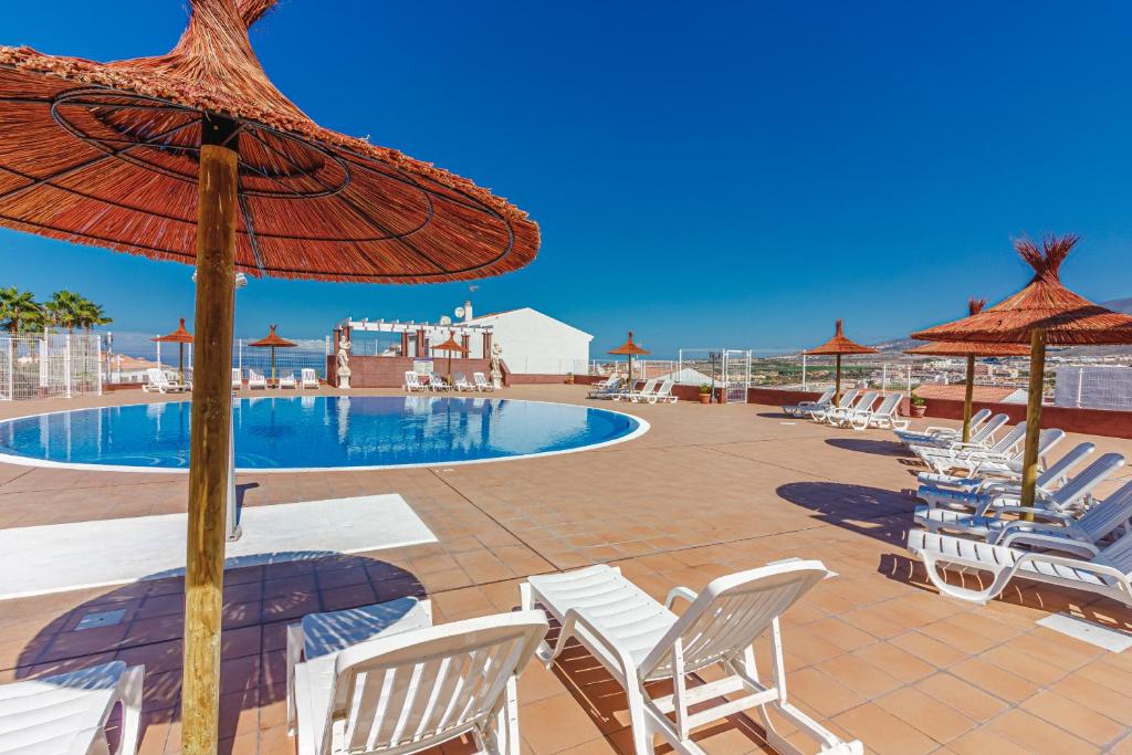 Πισίνα στο ή κοντά στο Apartment with ocean view in Costa Adeje