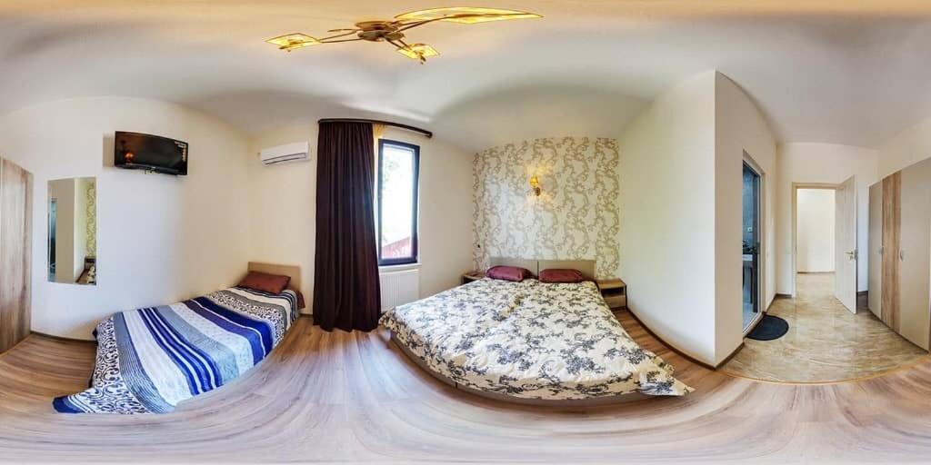 Postel nebo postele na pokoji v ubytování Hotel Alley