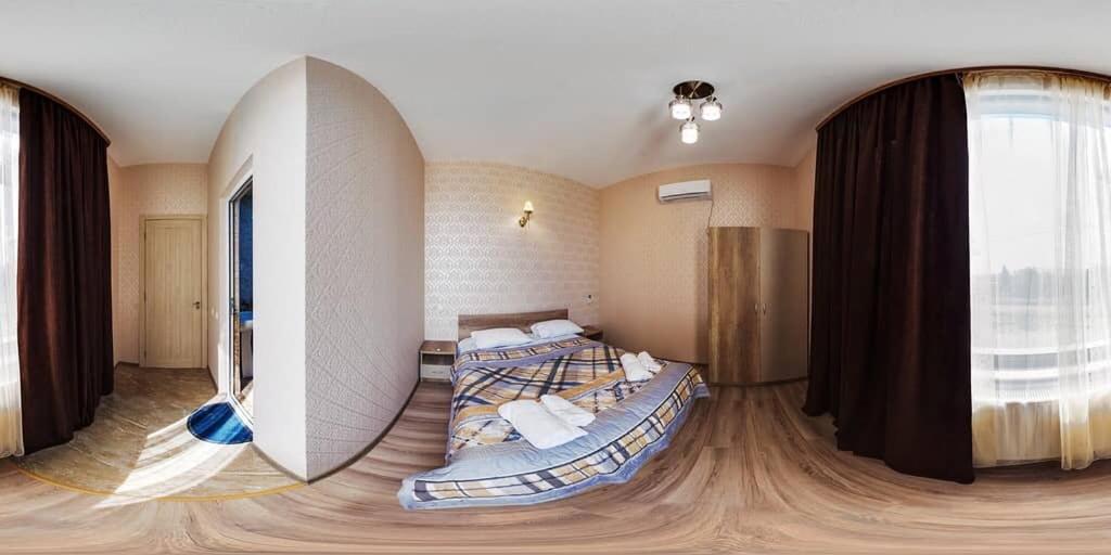 Postel nebo postele na pokoji v ubytování Hotel Alley