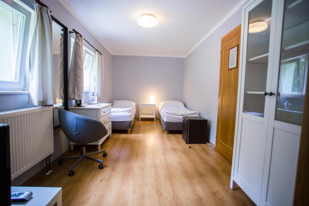 Postel nebo postele na pokoji v ubytování Resort Malevil