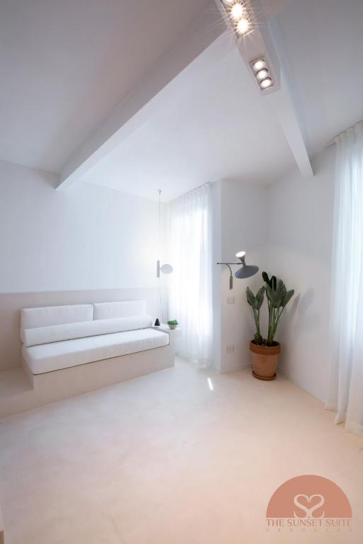 Postel nebo postele na pokoji v ubytování The Sunset Suite Vernazza