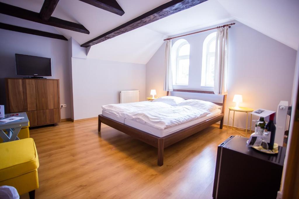 Postel nebo postele na pokoji v ubytování Resort Malevil