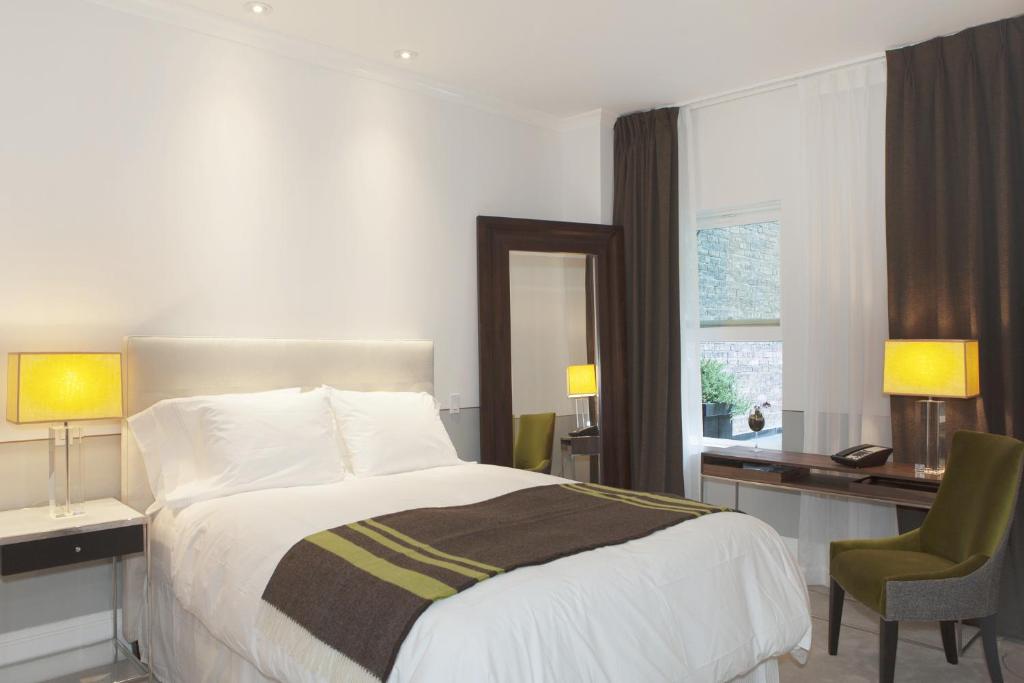 Cama ou camas em um quarto em The Broome