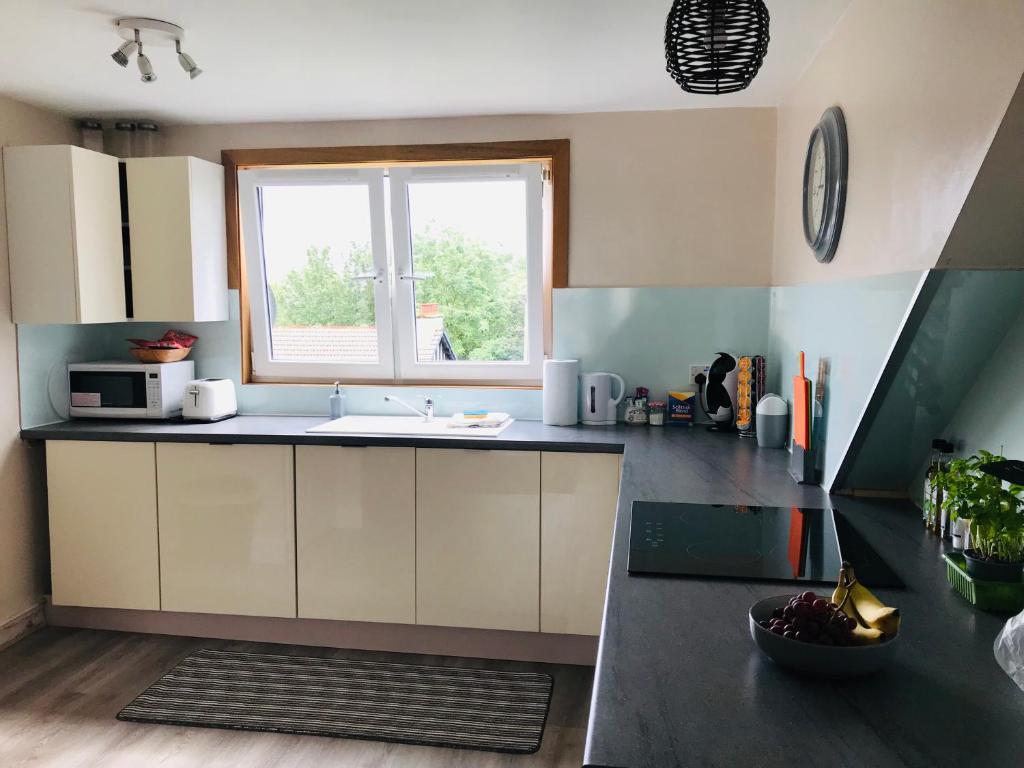 Kuchyň nebo kuchyňský kout v ubytování “A Wee Pad in Dunfermline”
