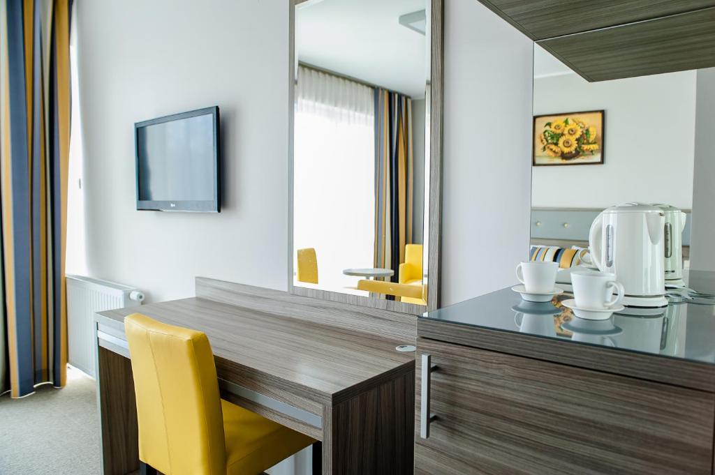 TV a/nebo společenská místnost v ubytování Hotel Jastarnia