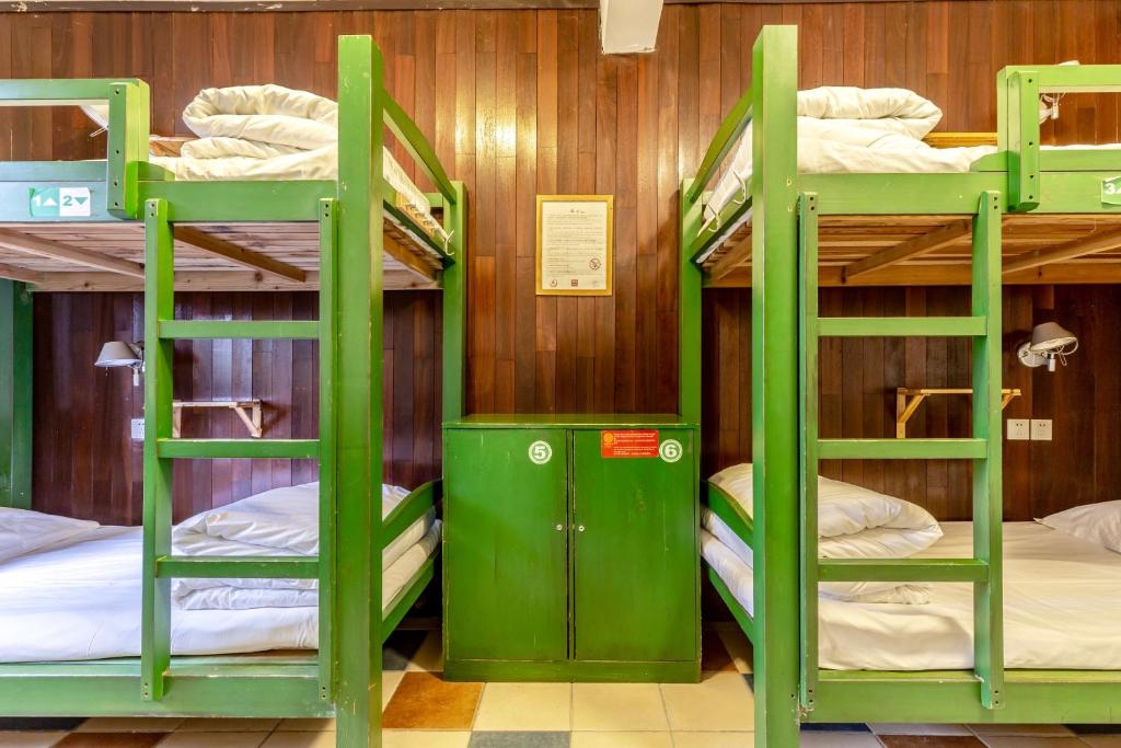 Palanda nebo palandy na pokoji v ubytování Hofang Guest House
