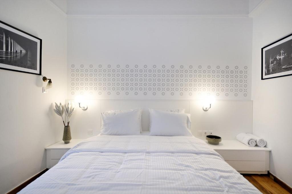 Posteľ alebo postele v izbe v ubytovaní Art in Athens Suite