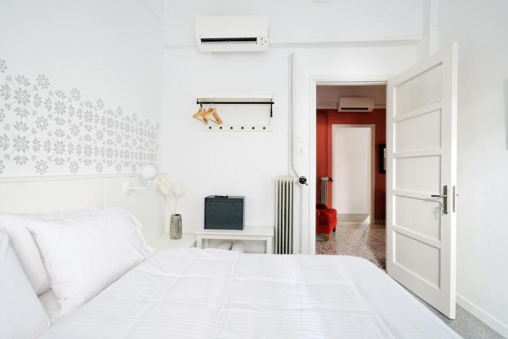 Posteľ alebo postele v izbe v ubytovaní Art in Athens Suite