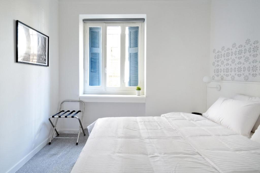 Posteľ alebo postele v izbe v ubytovaní Art in Athens Suite