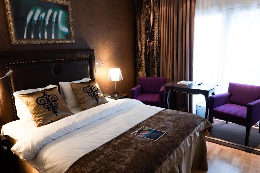Postel nebo postele na pokoji v ubytování Home Hotel Havnekontoret