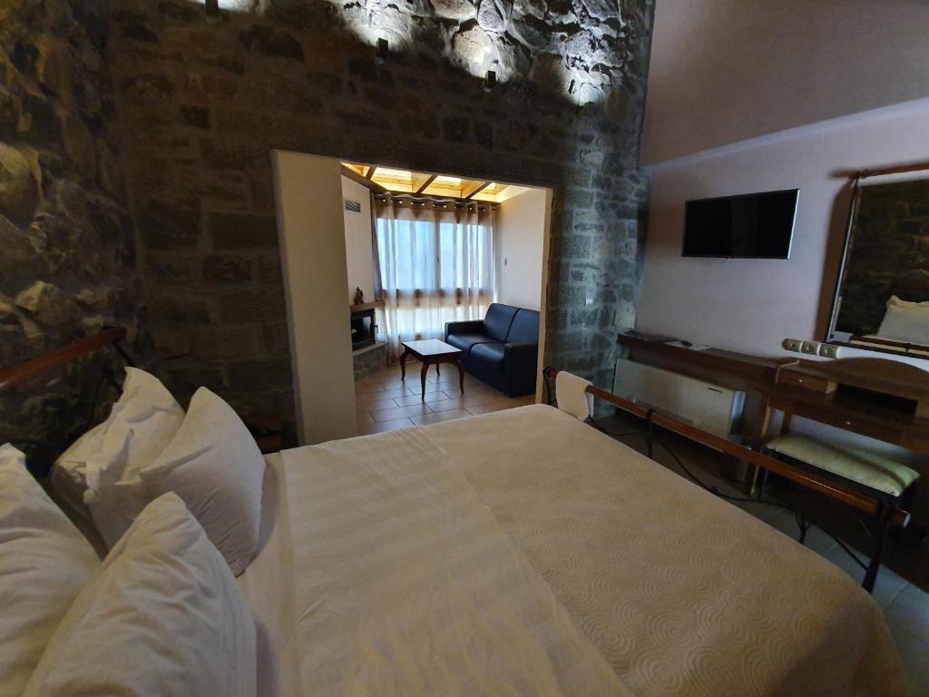 Postel nebo postele na pokoji v ubytování The View Village - Villas Suites & Spa