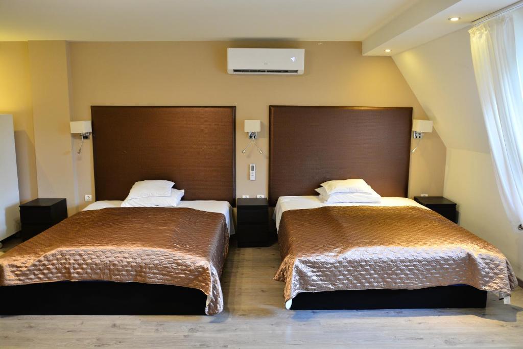 Posteľ alebo postele v izbe v ubytovaní Room4U Apartment