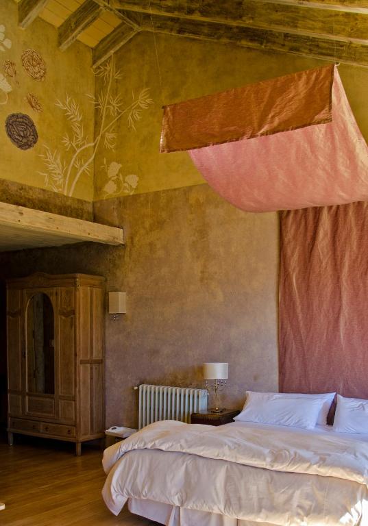 Postel nebo postele na pokoji v ubytování Luma Casa De Montaña