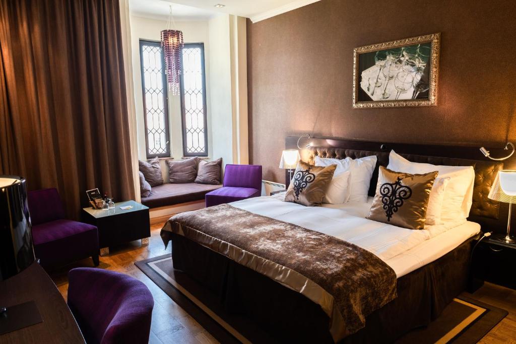 Postel nebo postele na pokoji v ubytování Home Hotel Havnekontoret