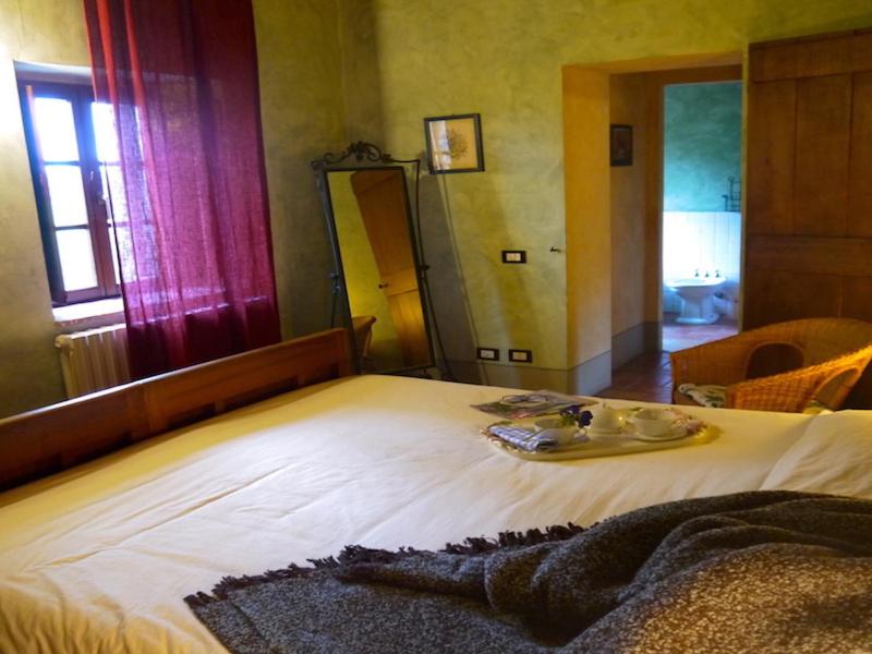 Postel nebo postele na pokoji v ubytování Agriturismo Borgo Santa Maria