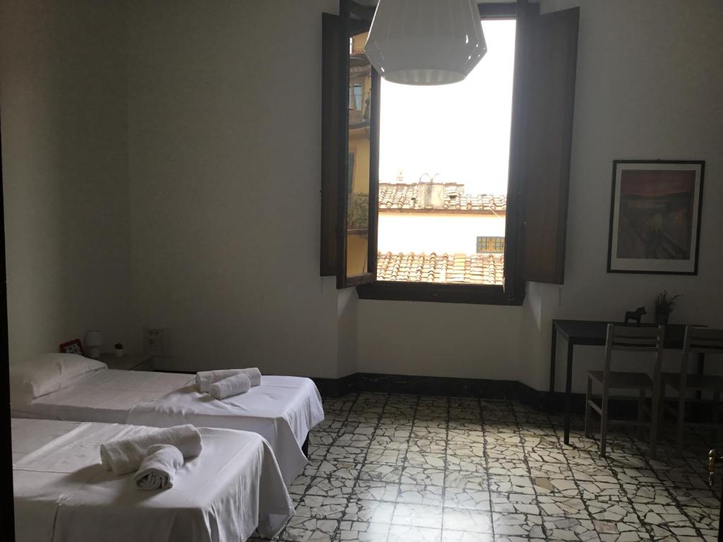 Posteľ alebo postele v izbe v ubytovaní Fortezza Third floor