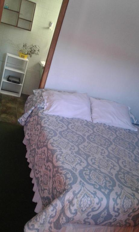 Postel nebo postele na pokoji v ubytování Habitaciones Florencia