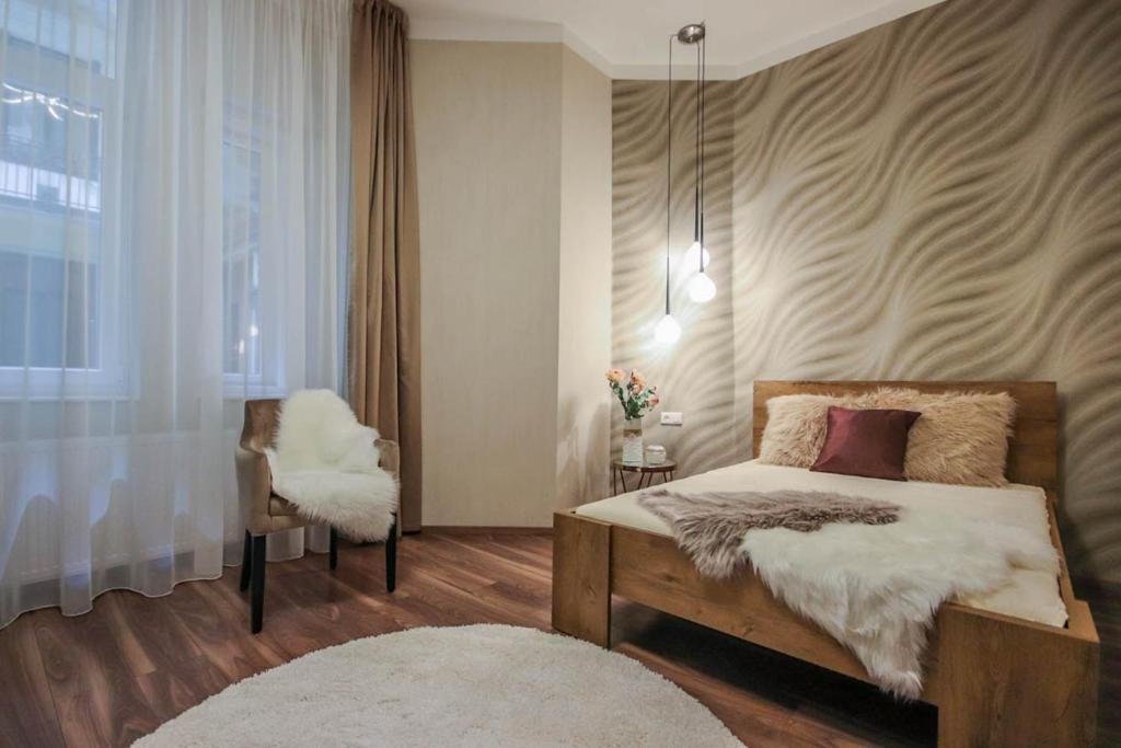 Posteľ alebo postele v izbe v ubytovaní Bengt Apartment Dohány Str.