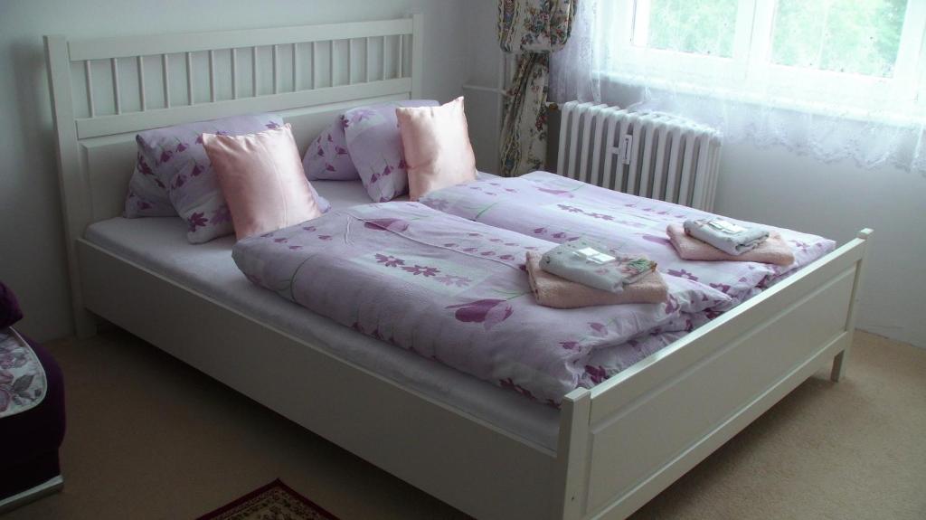 Łóżko lub łóżka w pokoju w obiekcie Apartments Meixner