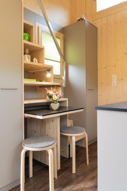 Kuchyň nebo kuchyňský kout v ubytování Fiechtehüsli (tiny house)