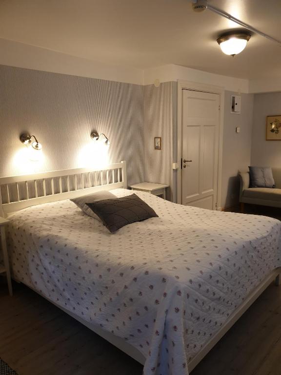 Postel nebo postele na pokoji v ubytování Lilla Hotellet