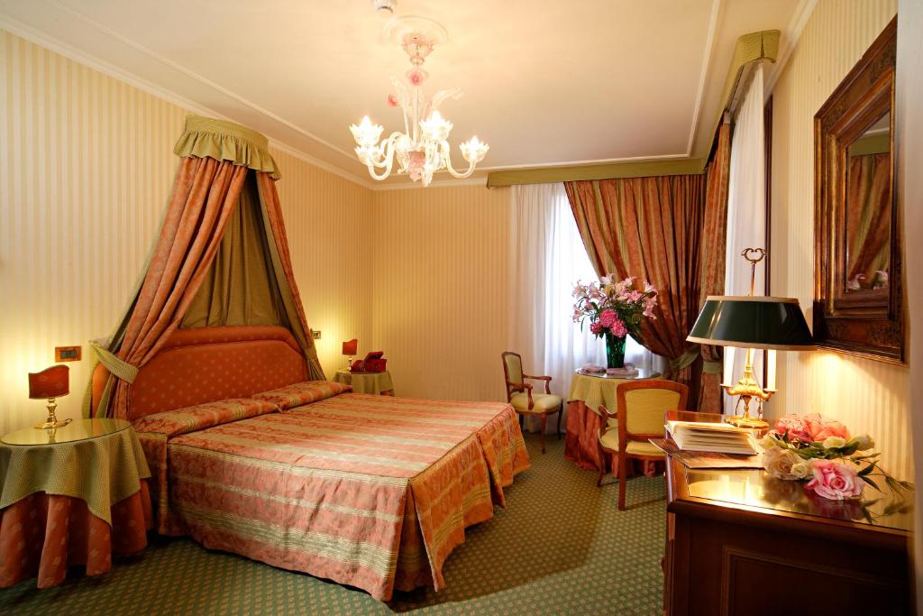 Postel nebo postele na pokoji v ubytování Hotel Kette