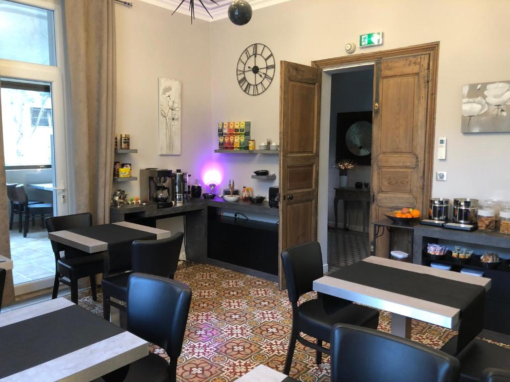Posezení v ubytování Hôtel Le Lys d'Or