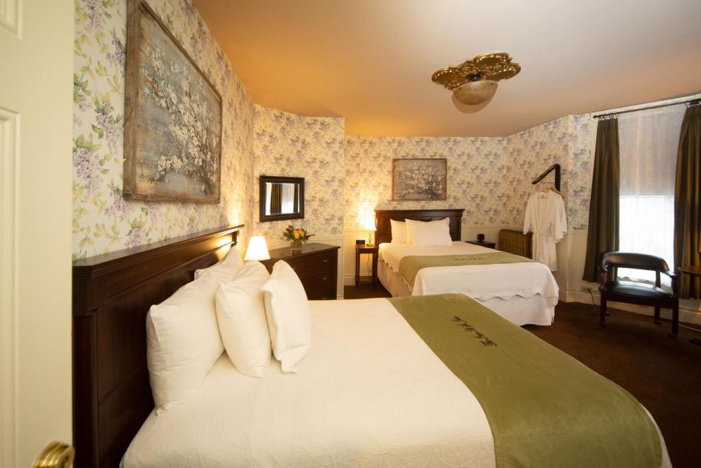 Ένα ή περισσότερα κρεβάτια σε δωμάτιο στο Inn at St John Portland In-Town