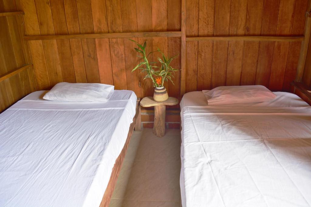 Letto o letti in una camera di Posada Hannany