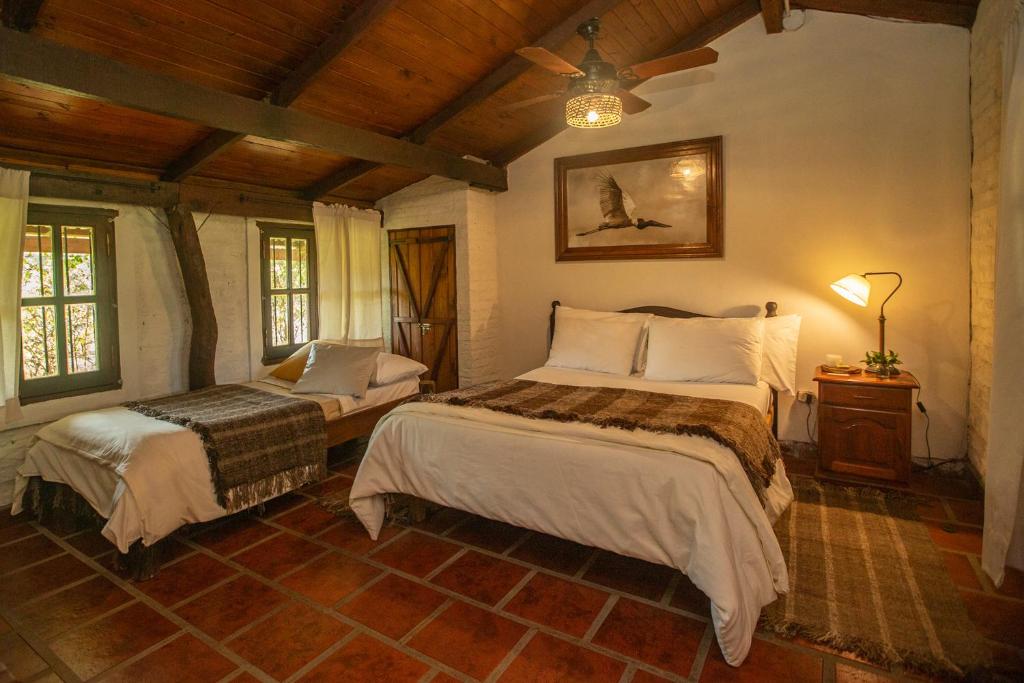 Postel nebo postele na pokoji v ubytování Posada Uguay - Esteros del Iberá