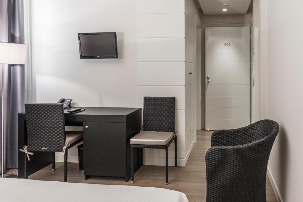 TV a/nebo společenská místnost v ubytování Tag Hotel