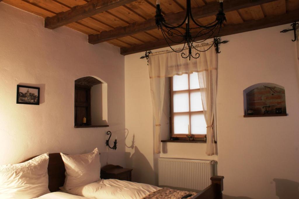 Ένα ή περισσότερα κρεβάτια σε δωμάτιο στο Casa Richter- Check-in Independent
