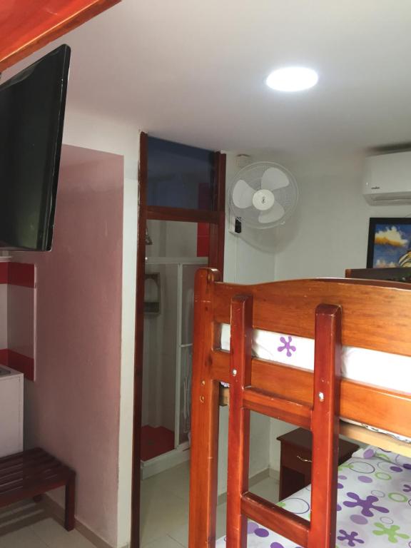 Postel nebo postele na pokoji v ubytování Hostal Sarai