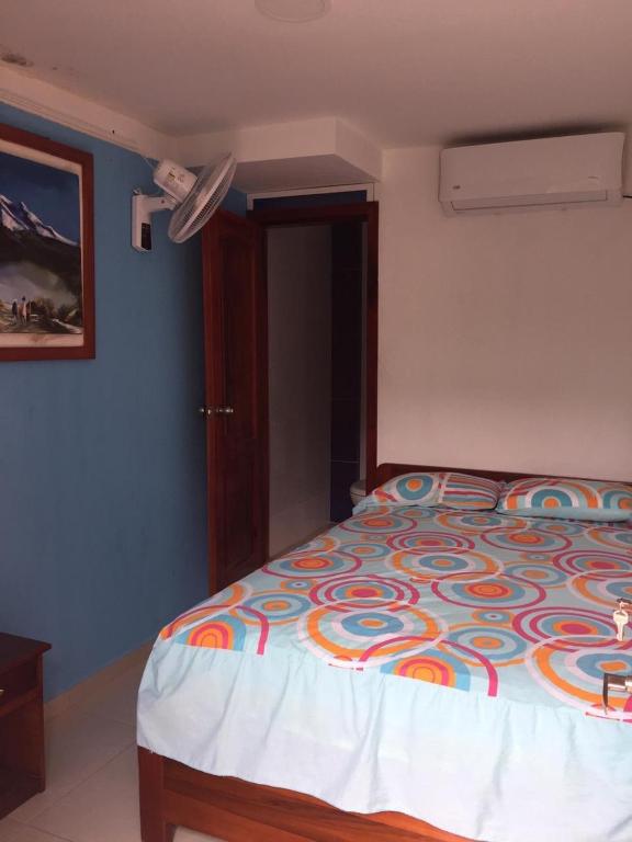 Postel nebo postele na pokoji v ubytování Hostal Sarai