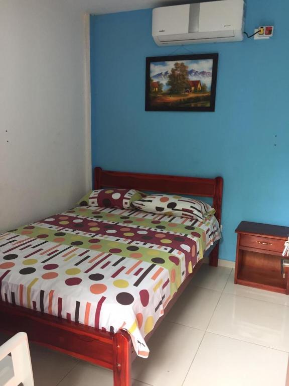 Postel nebo postele na pokoji v ubytování Hostal Sarai