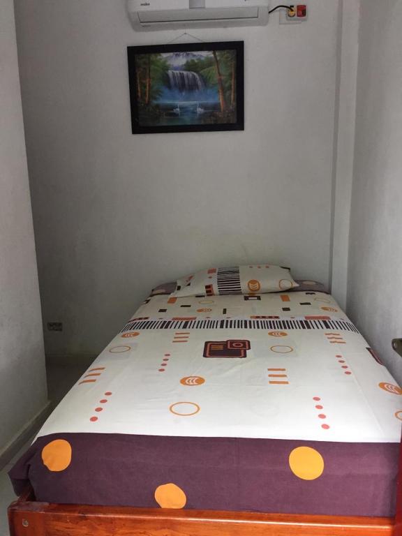 Postel nebo postele na pokoji v ubytování Hostal Sarai