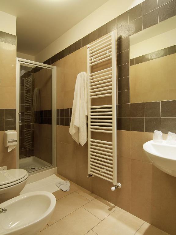 Koupelna v ubytování Hotel Cluentum