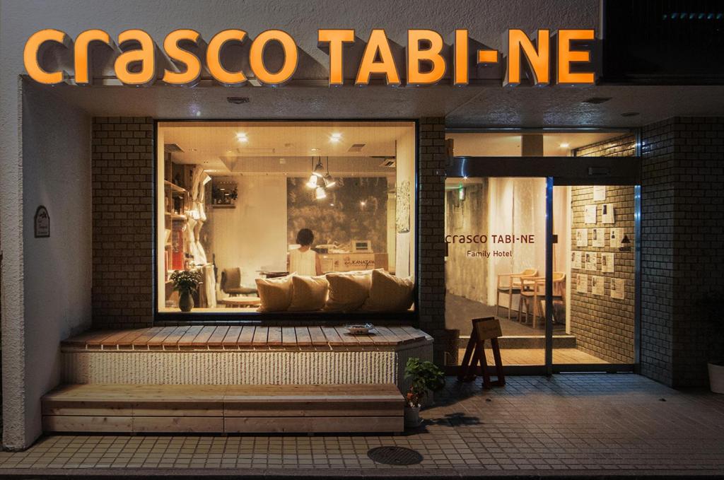 a store front with a casco tabelne sign in the window at Crasco TABI-NE in Kanazawa