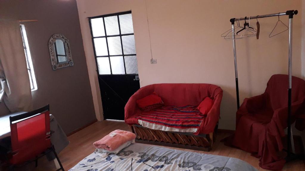 Posezení v ubytování El laberinto hospedaje en casa