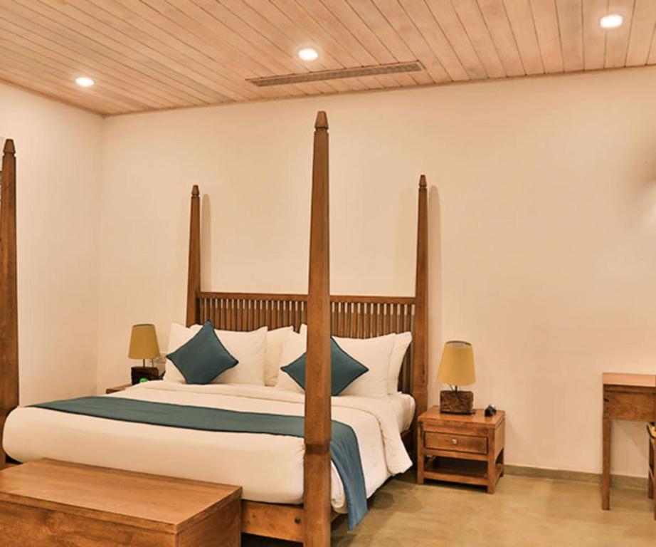 Postel nebo postele na pokoji v ubytování Regenta Arie Lagoon Negombo
